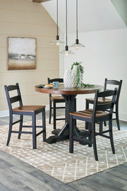 Signature Design by Ashley Valebeck 4-piece counter height dining room set with table and four chairs in a modern finish.