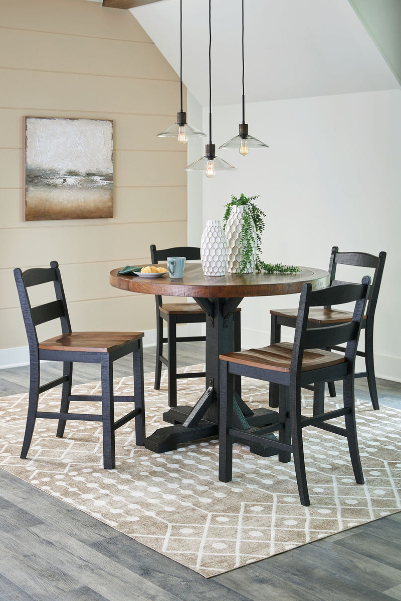 Signature Design by Ashley Valebeck 4-piece counter height dining room set with table and four chairs in a modern finish.