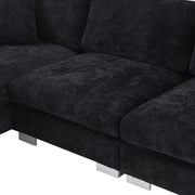 Luxe & Co. Modern L-shaped cloud sectional sofa with oversized chaise, four seats, and two decorative pillows in a stylish living room setting.