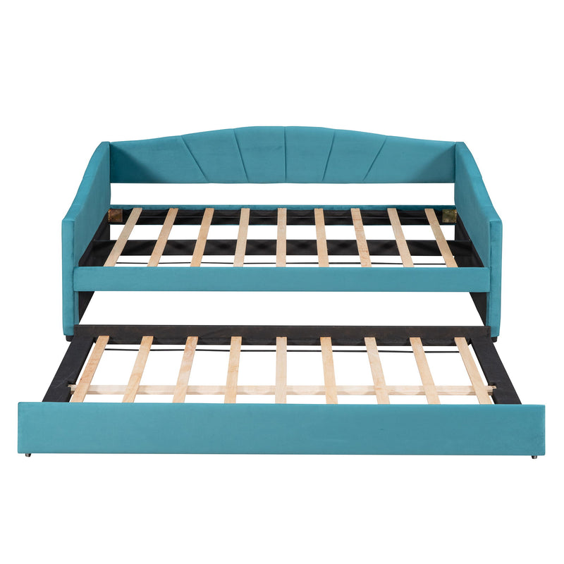 DreamHaus upholstered daybed sofa bed with trundle and wood slat, showcasing plush fabric, wooden frame, and additional sleeping space.