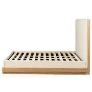 ACME Zoey upholstered bed with plush fabric and modern design, featuring a padded headboard and sturdy wooden frame.