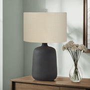 Contemporary black 8th Street table lamp with sleek design and modern style, perfect for living room or bedside lighting.