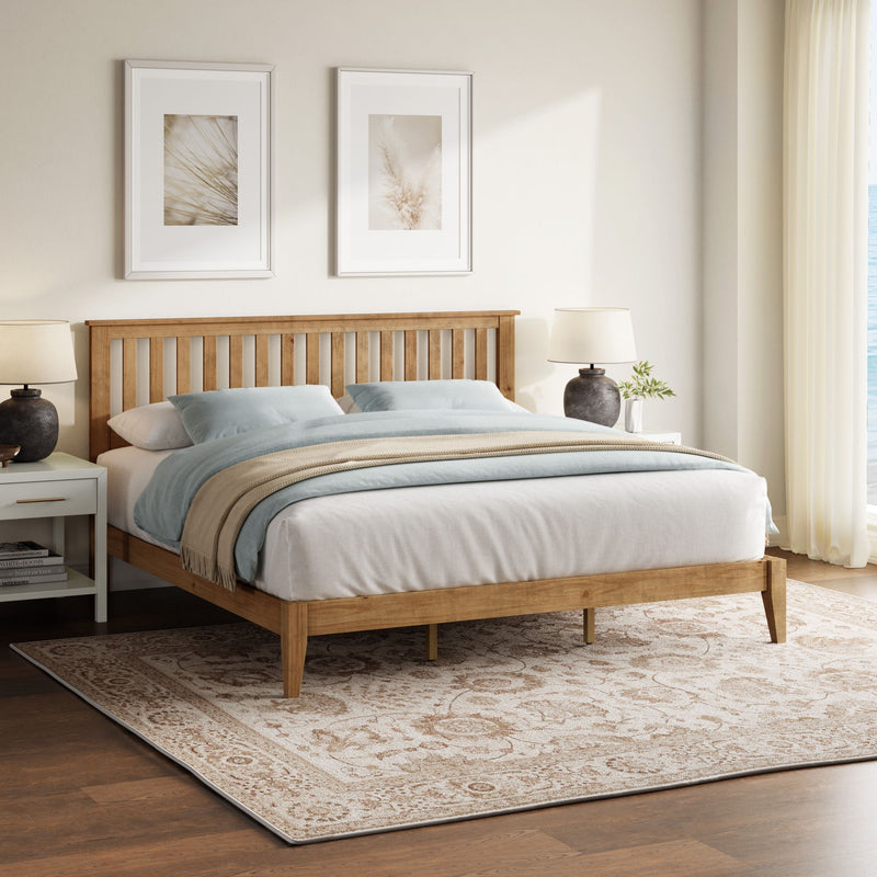 Ridgecrest Home Malinda panel bed with a wooden frame and headboard, showcasing a modern design in a bedroom setting.
