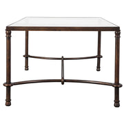 Uttermost Warring Iron Coffee Table with round metal top and industrial-style legs, modern design for living room decor.