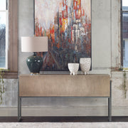 Contemporary Nevis console table by Uttermost with light brown finish and sleek modern design for living or entryway spaces.