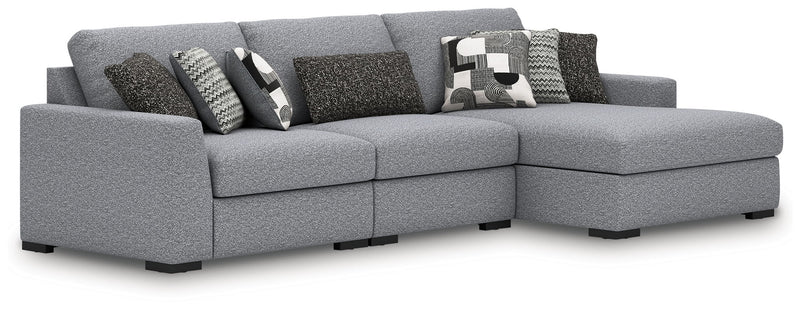 Benchcraft Bealton sectional sofa, a stylish stationary sectional with plush cushions and modern design, shown in a living room setting.