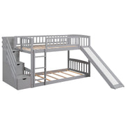 Gray DreamHaus twin over twin bunk bed with stairway, two drawers, and slide, featuring a sturdy design and cozy sleeping area.