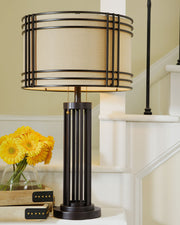 Hanswell - Metal Table Lamp  - Dark Brown - R&R Furniture Gallery (Fountain Valley, CA)