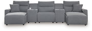 Signature Design by Ashley Modmax II reclining sectional in salt and pepper fabric, showing plush cushions and reclining features.