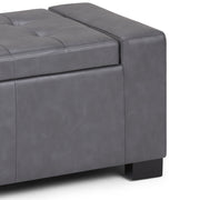 Large contemporary storage ottoman by Simpli-Home with fabric upholstery and wooden legs, open lid revealing interior storage space.