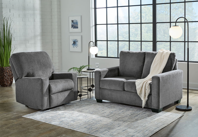 Signature Design by Ashley Rannis 2-piece living room set with sofa and matching armchair in a modern living space.