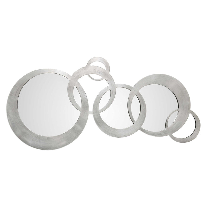 Silver Odiana modern wall mirror by Uttermost featuring a sleek, round mirror with a contemporary silver frame.
