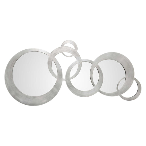 Silver Odiana modern wall mirror by Uttermost featuring a sleek, round mirror with a contemporary silver frame.