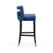 TOV Furniture Hart velvet bar height stool with a sleek design, featuring plush upholstery and modern style for high seating areas.
