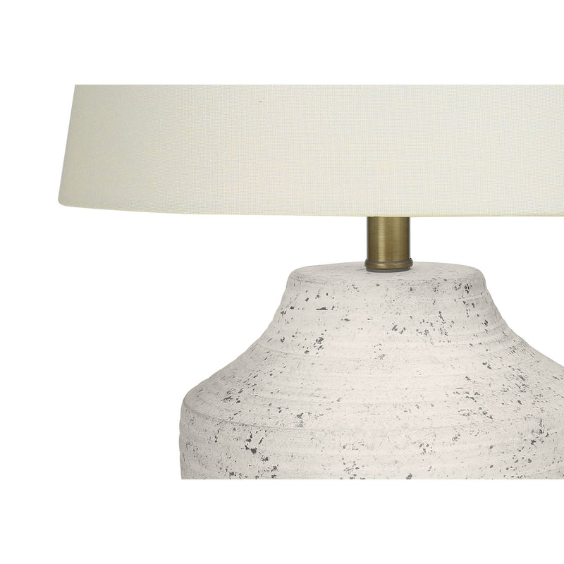 Cream concrete table lamp with modern design by 8th Street, featuring a sleek, minimalist aesthetic and a cylindrical shape.