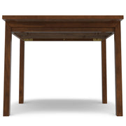 Wilson handcrafted dining table by Simpli-Home featuring a wooden surface and sturdy legs in a modern design.