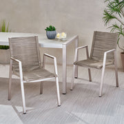 Set of two Noble House outdoor modern aluminum dining chairs with rope sea accents, featuring sleek frames and woven seat details.