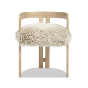Natural blonde Millwick low back arm chair by Jennifer Taylor Home, featuring a sleek wooden frame and upholstered seat.