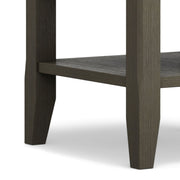Handcrafted Acadian end table by Simpli-Home with a wooden finish, featuring a square top and sturdy legs for living room decor.