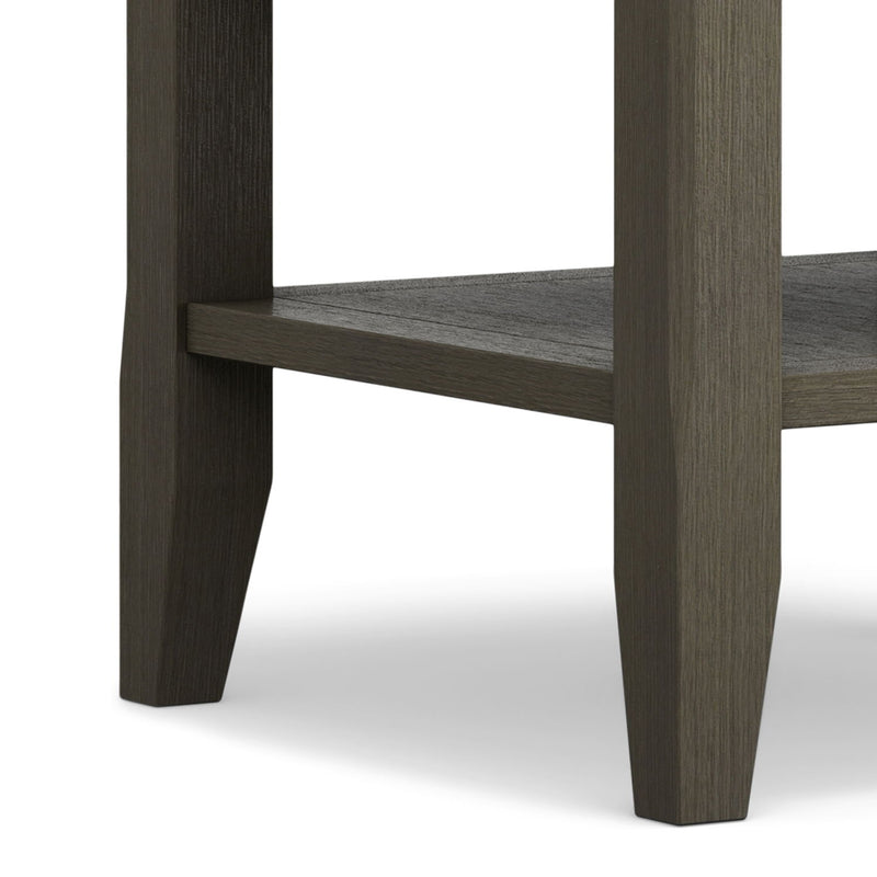 Handcrafted Acadian end table by Simpli-Home with a wooden finish, featuring a square top and sturdy legs for living room decor.
