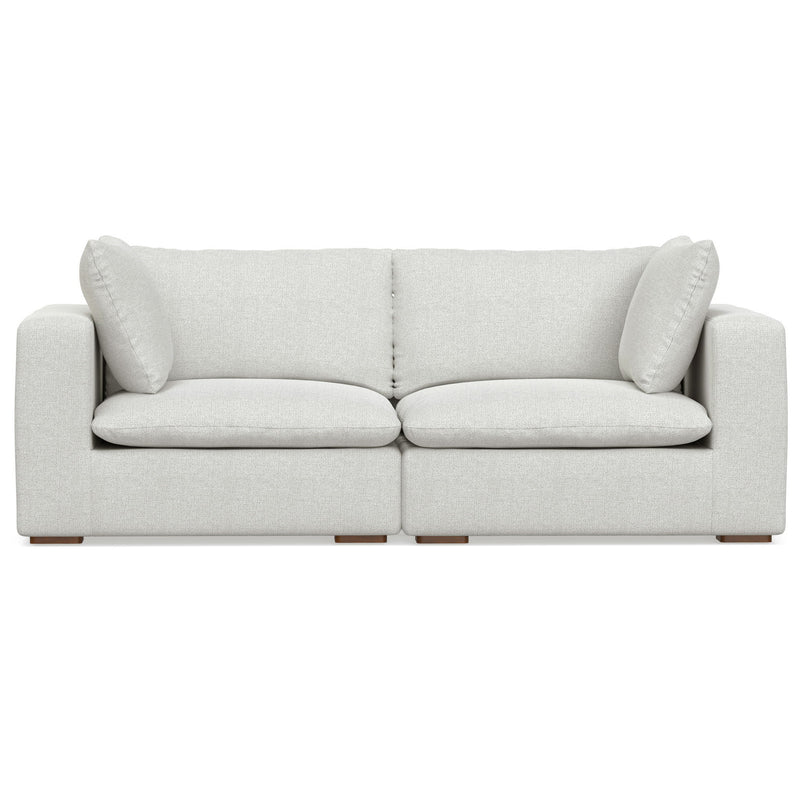 Handcrafted Jasmine stationary sofa by Simpli-Home featuring plush cushions and elegant upholstery in a cozy living room setting.