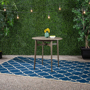 Noble House outdoor acacia wood bar table with slat top, sturdy design suitable for patio or garden entertaining.