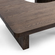 Classic Home Melina coffee table with a sleek wooden surface and modern design, perfect for living room decor.