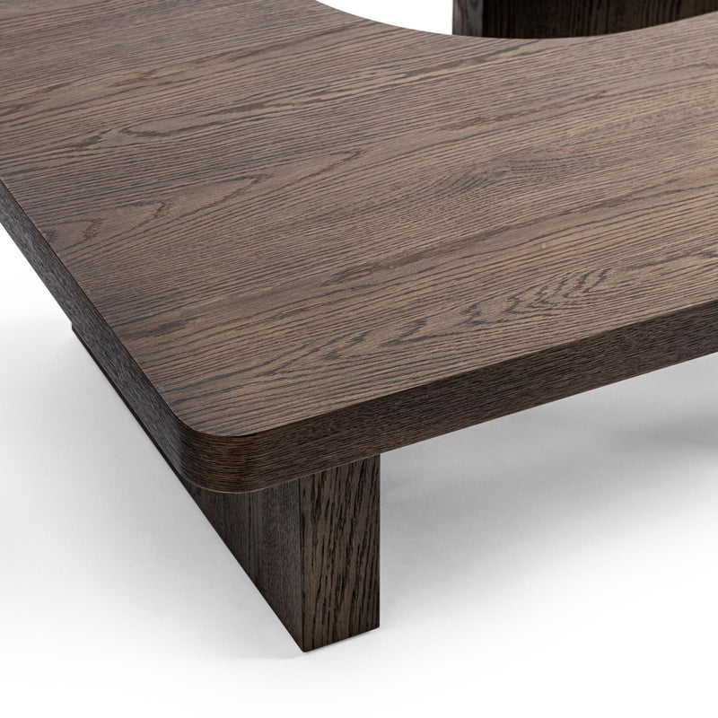 Classic Home Melina coffee table with a sleek wooden surface and modern design, perfect for living room decor.