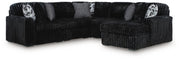 Signature Design by Ashley Midnight-Madness stationary sectional sofa with plush cushions and modern design.