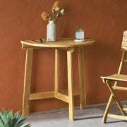 Outdoor Noble House half round folding bistro table made of acacia wood, ideal for patio or garden seating areas.