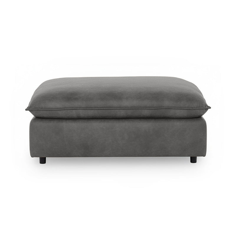 Classic Home Caplan upholstered ottoman in neutral fabric, showcasing a stylish and comfortable footstool with a modern design.