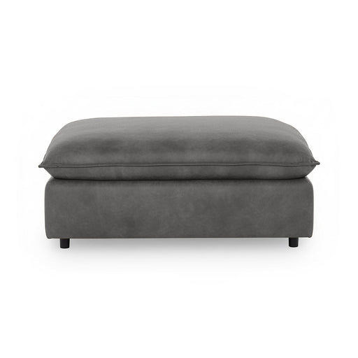Classic Home Caplan upholstered ottoman in neutral fabric, showcasing a stylish and comfortable footstool with a modern design.