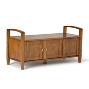 Handcrafted Warm Shaker entryway storage bench by Simpli-Home with a wooden finish and cushioned seat for seating and storage.