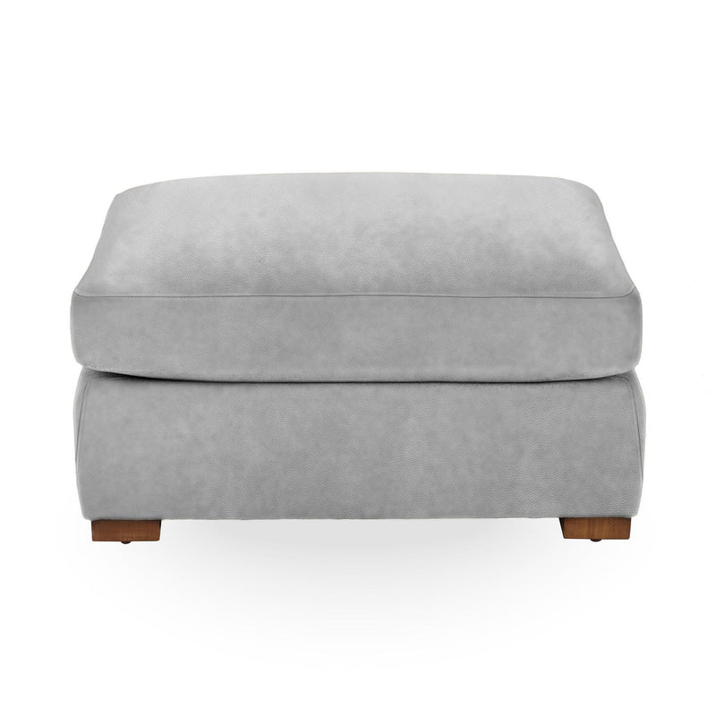 Classic Home Audrey upholstered ottoman with plush fabric and rounded design, ideal for living room decor.