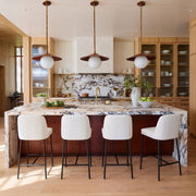 Set of two TOV Furniture Sydney counter stools with wooden legs and cushioned seats, ideal for kitchen or breakfast bar.