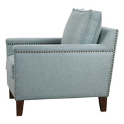 Uttermost Charlotta accent arm chair in Sea Mist fabric with plush cushioning and wooden legs, stylish living room seating.