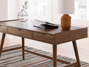 Signature Design by Ashley Lyncott home office desk with a spacious writing surface and modern design.