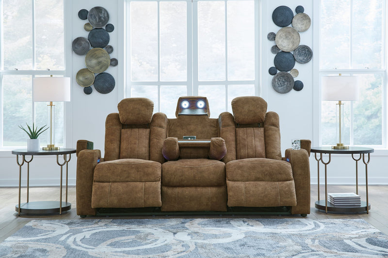 Wolfridge - Power Reclining Sofa With Adj Headrest - Brindle - R&R Furniture Gallery (Fountain Valley, CA)