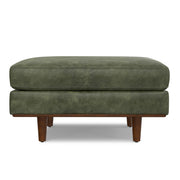 Simpli-Home Morrison handcrafted upholstered ottoman with plush fabric and wooden legs, versatile for living room decor.