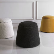 Upholstered Gumdrop Ottoman by Uttermost featuring a rounded, cushioned design with fabric upholstery in a modern style.