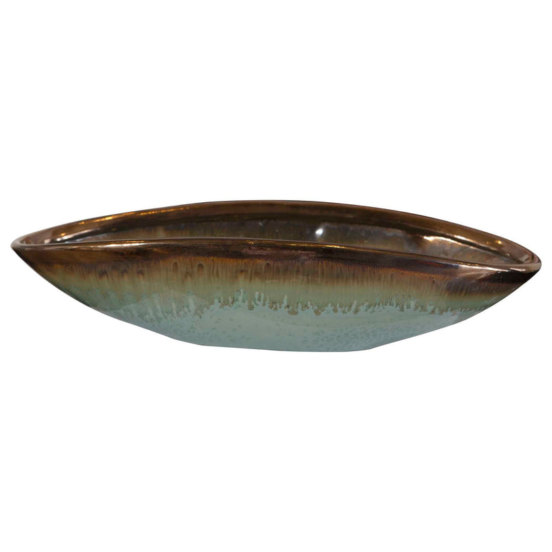 Green Iroquois glaze bowl by Uttermost, showcasing a smooth, rounded ceramic plate with a glossy finish and vibrant green color.