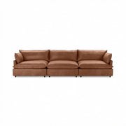 Classic Home Caplan modular sectional sofa with plush cushions and modern design, shown in a cozy living room setting.