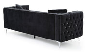 Glory Furniture Paige stationary sofa with plush cushions and fabric upholstery, showcased in a modern living room setting.