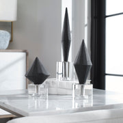 Set of three Alize Sculptures by Uttermost, modern decorative figurines with sleek, artistic design on a neutral background.