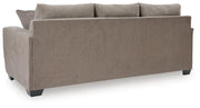 Loreo sofa sleeper by Benchcraft® featuring a modern design, plush cushions, and a convertible sleeping surface.