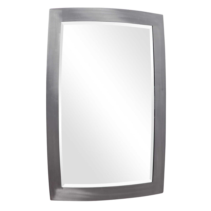 Uttermost Haskill wall mirror with brushed nickel finish, round shape, and modern design, hanging on a wall.