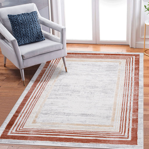 Marfi - 6' X 9' Bordered Area Rug - Brown / Ivory - R&R Furniture Gallery (Fountain Valley, CA)