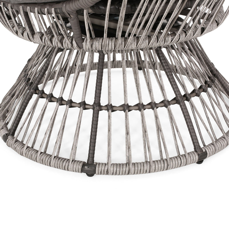 Noble House patio swivel basket egg chair with cushion, outdoor accent chair featuring woven design and plush seating.