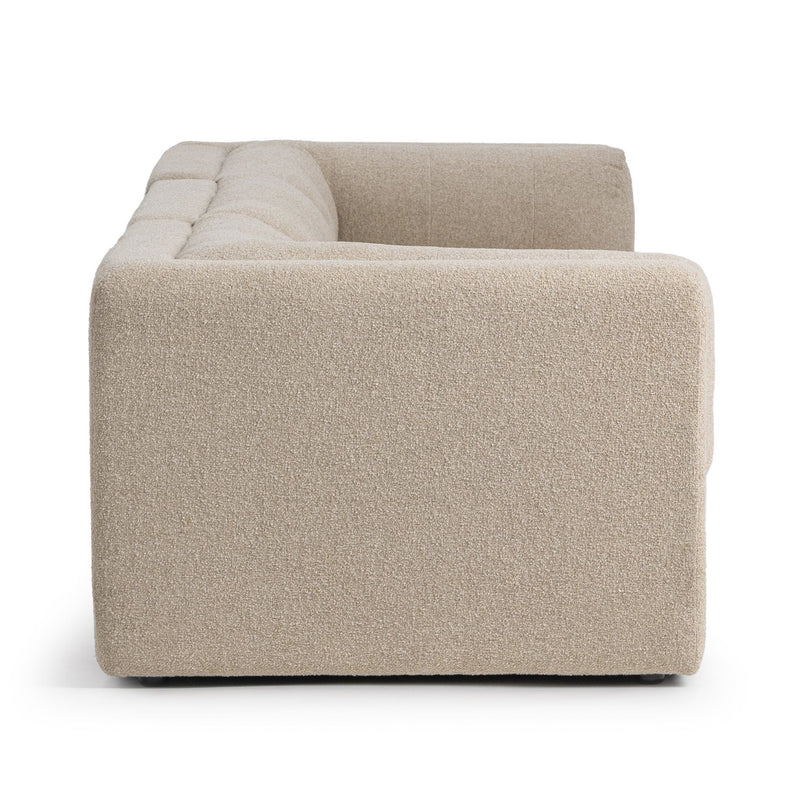 Classic Home Adalynne stationary sectional sofa with plush cushions and modern design, shown in a spacious living room setting.