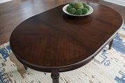 Lavinton - Oval Dining Room Extension Table - Brown - R&R Furniture Gallery (Fountain Valley, CA)